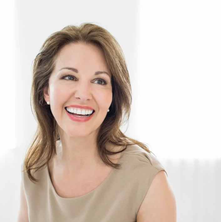 Happy woman with radiant skin smiling after using Fresh Comfort Gel for daily skin care.