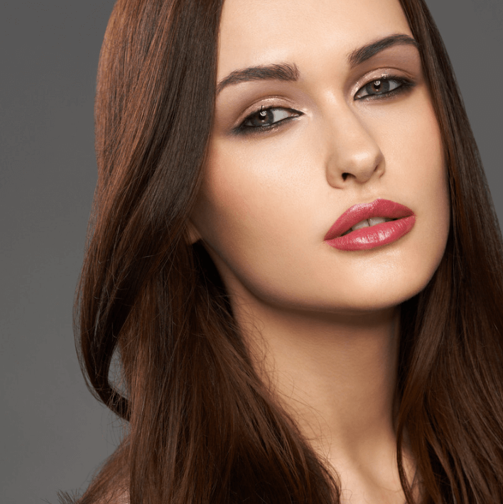 Premium Hair Shampoo enhances the look of smooth, glossy hair with a polished finish.