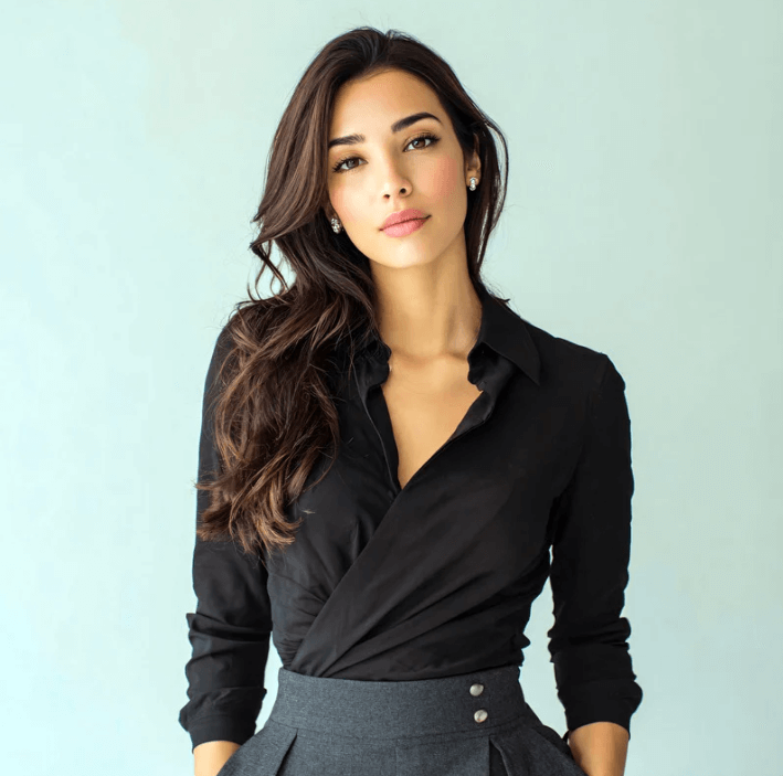 Model showcasing a polished look in a black wrap shirt, enhancing beauty and elegance.