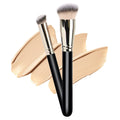2-Piece Angled Foundation and Concealer Brush Set with soft synthetic bristles on a background of foundation swatches.